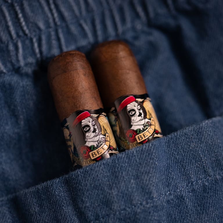 2 deadwood fatbottom betty cigars in a jean pocket