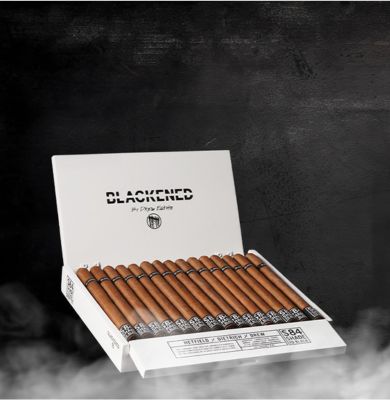 a man posing holding a cigar case and cigar