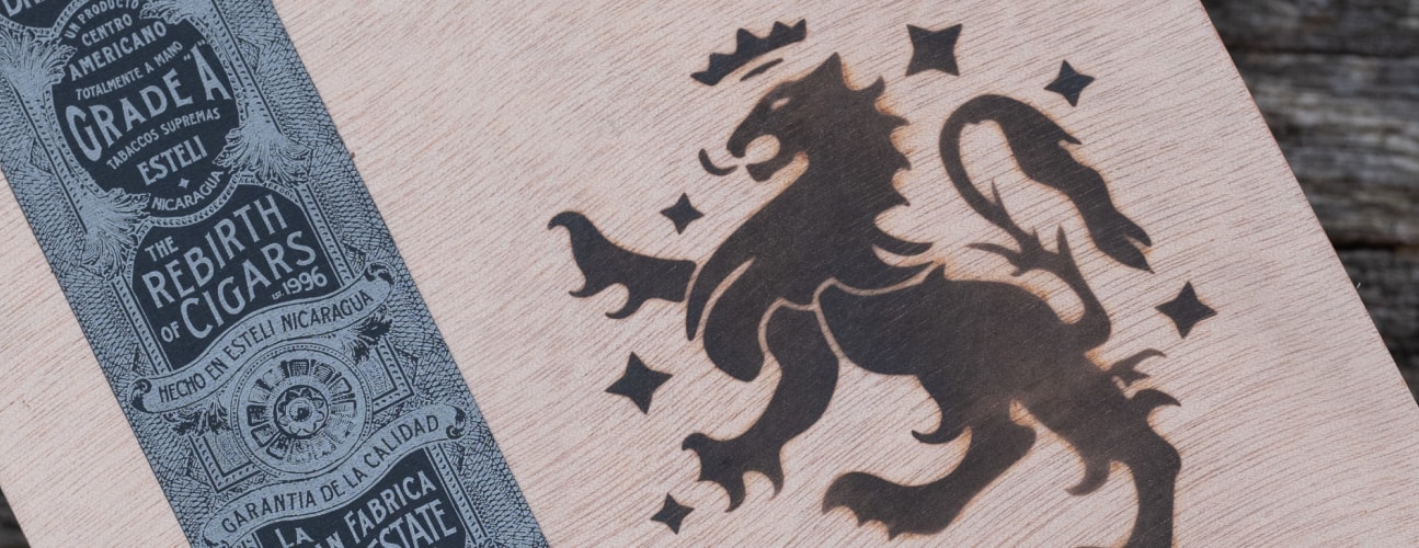 liga privada unico cigar wooden box featuring an intricate lion design