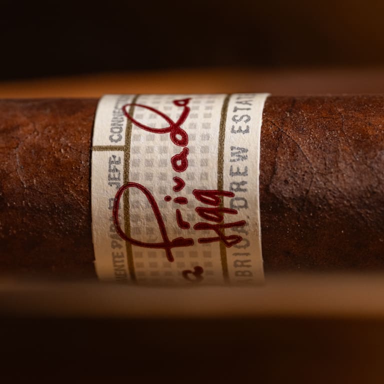 Close up of a Liga Privada H99 cigar showing the cigar band.