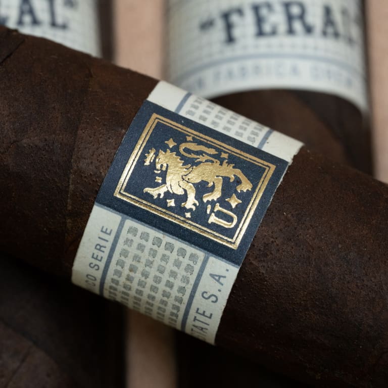 Close up of a Liga Privada Unico cigar showing the cigar band.