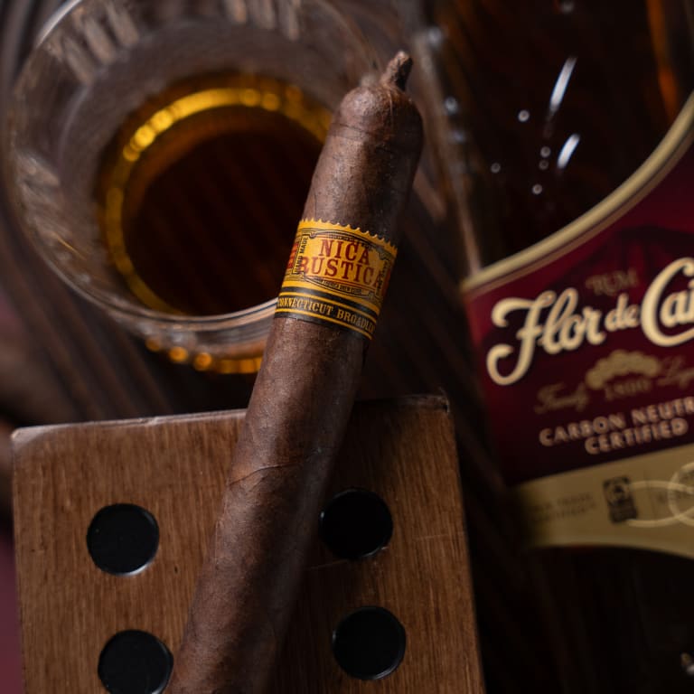 nica rustica broadleaf cigar over a glass of Rum