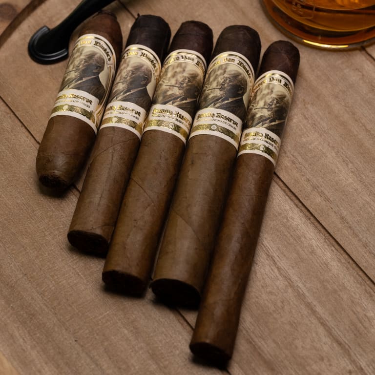 5 pappy van winkle cigars lined up next to each other
