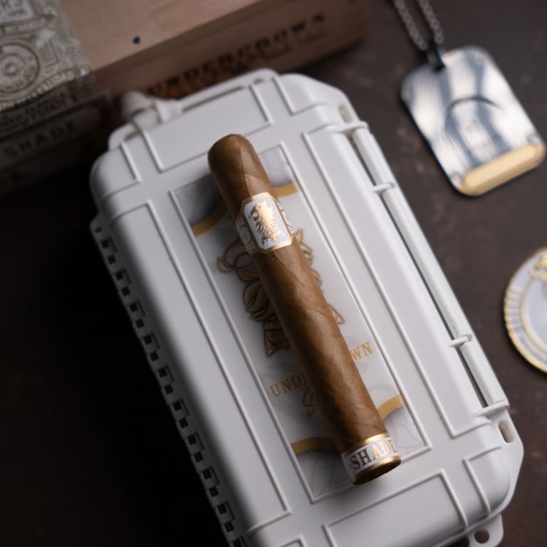 undercrown shade cigar over a white container