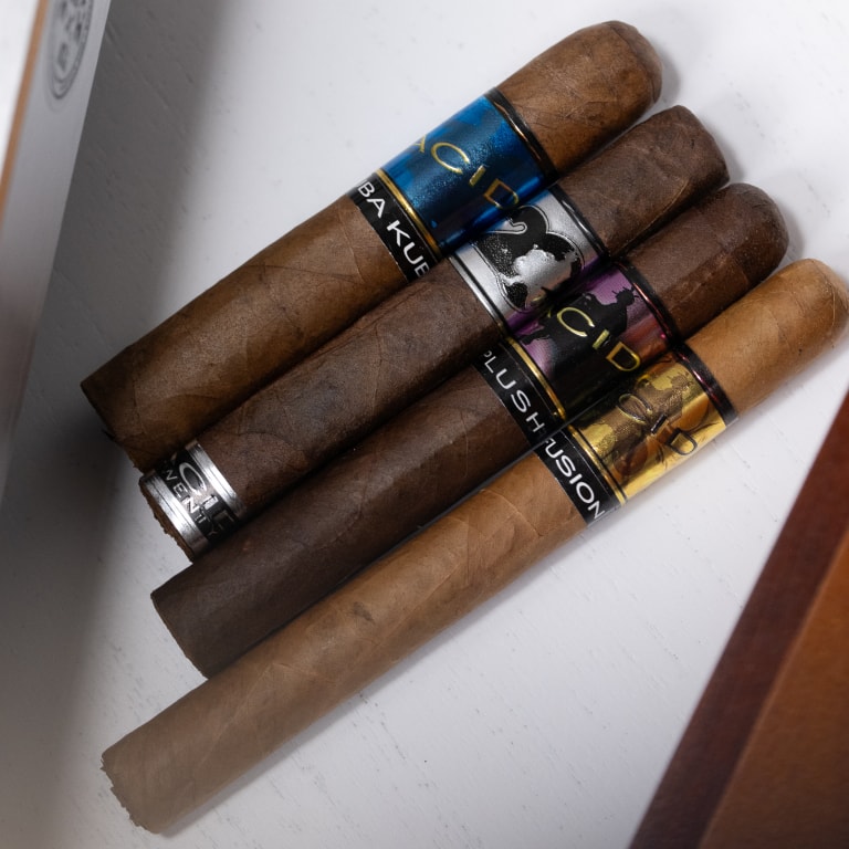an assorted group of Acid cigars