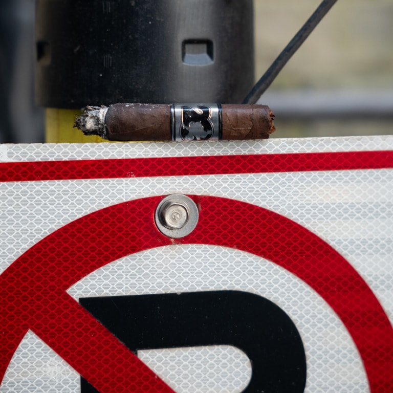 an Acid 20 cigar lit on a signal
