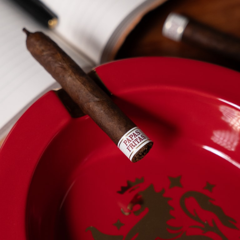 a Liga Privada Papas fritas cigar on an ashtray