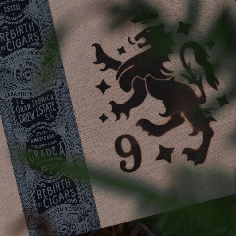 A fine wooden box featuring a lion design, elegantly crafted for Liga Privada cigars
