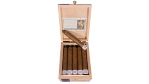A Papas Bravas cigar atop a box of cigars
